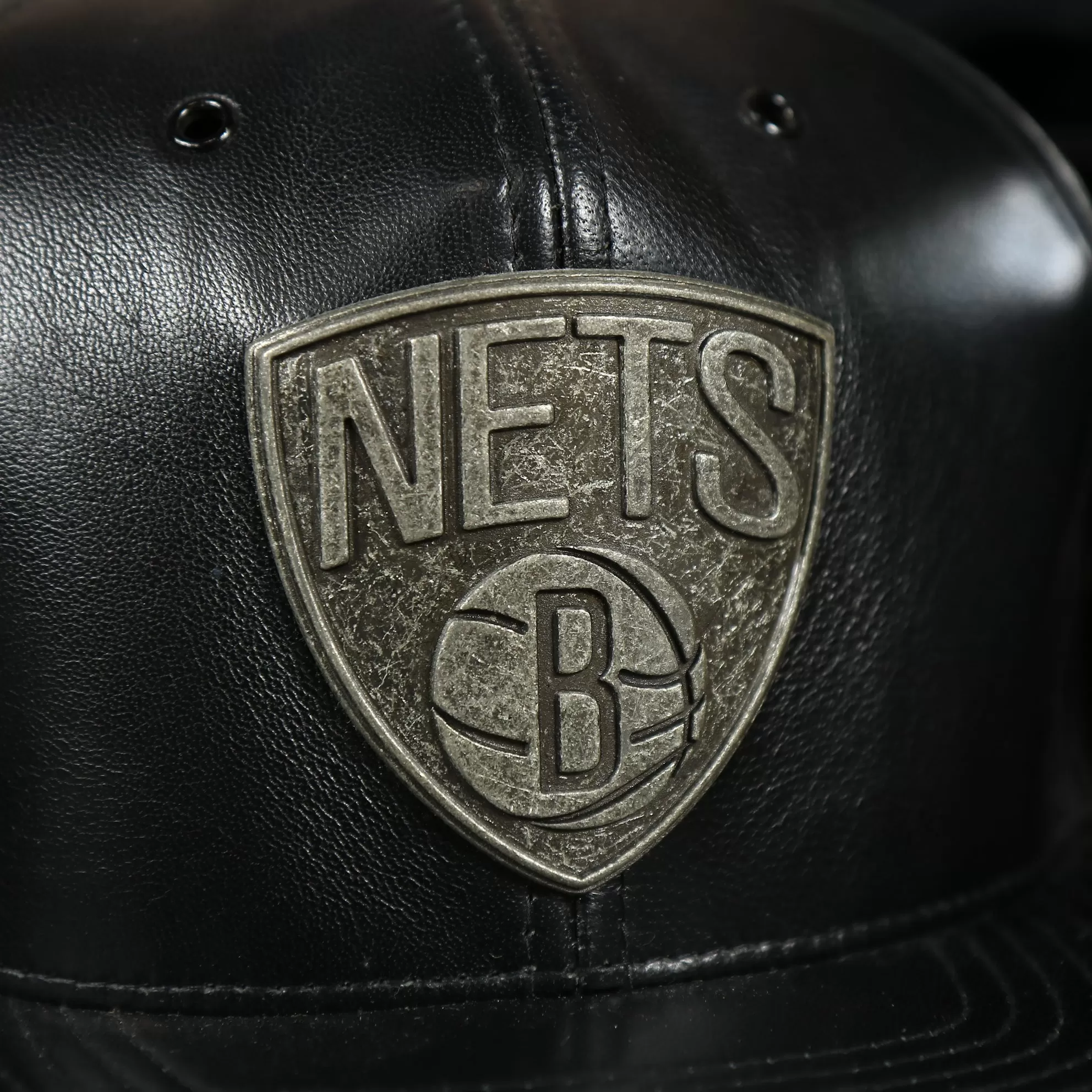 Brooklyn Nets 100% Genuine Lambskin Leather Mitchell and Ness Embossed Metalic Shield Snapback Hat