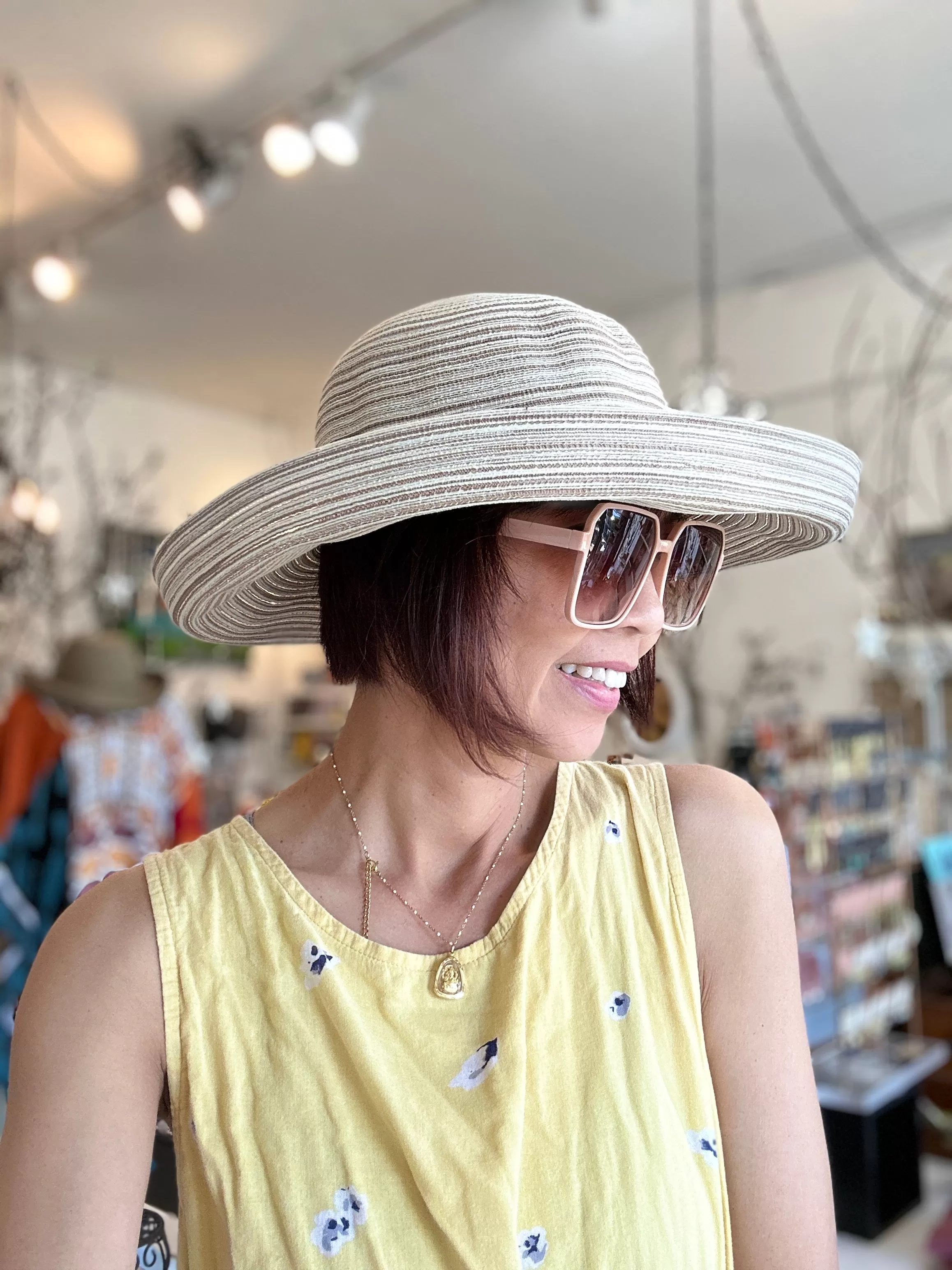 Isla Sun Hat: Packable Sun Hat with Rope Leather and Wood Charm Accents