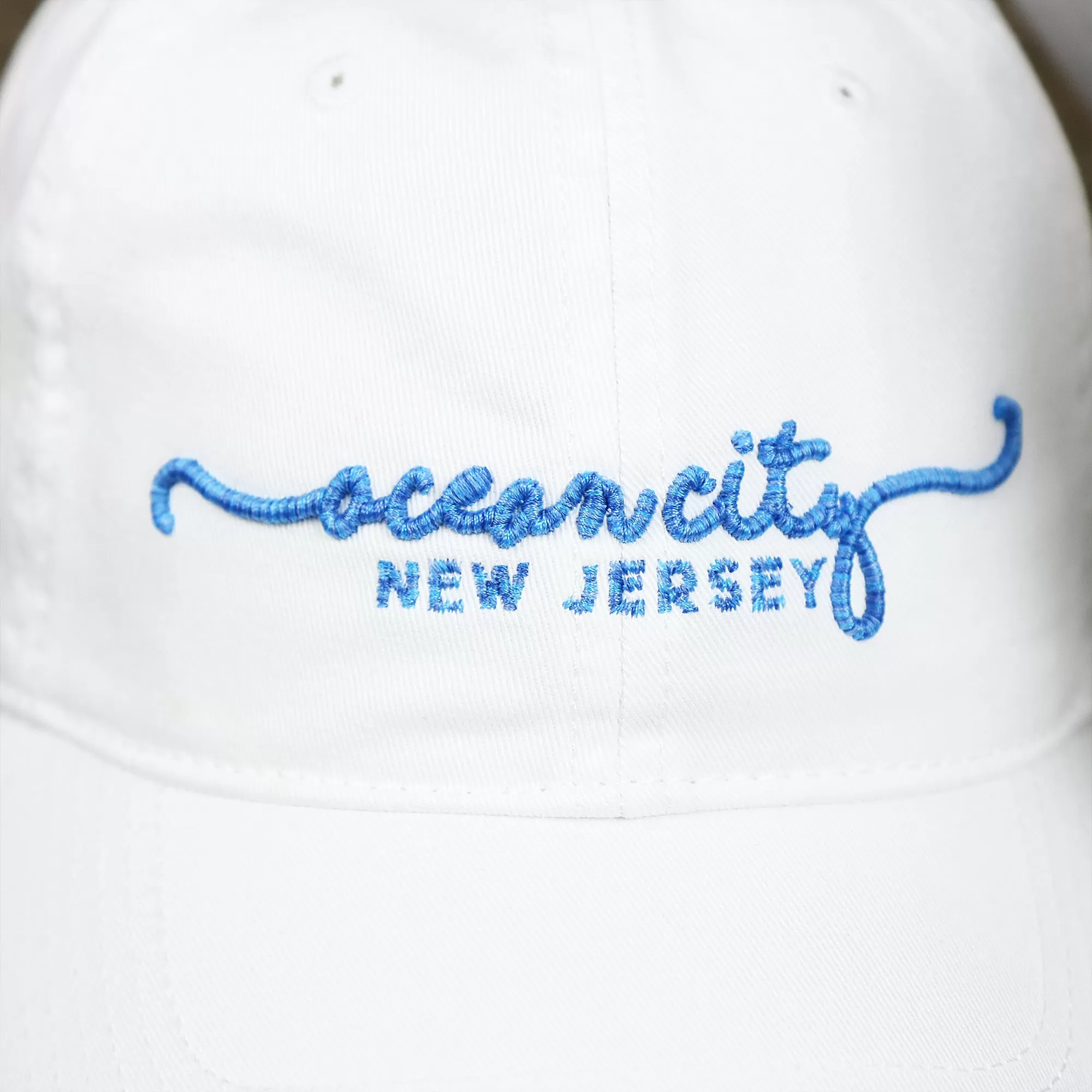 OCNJ New Jersey Ocean City Cursive Wordmark Dad Hat | White Dad Hat